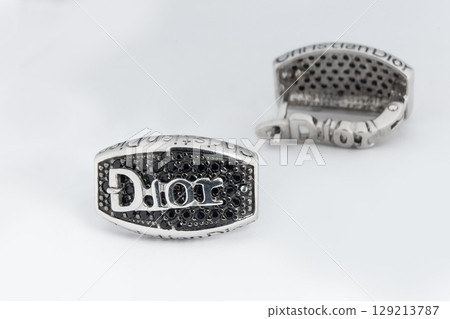 Luxury silver round earrings big jewelry for women isolated on white background, clipping path included 129213787
