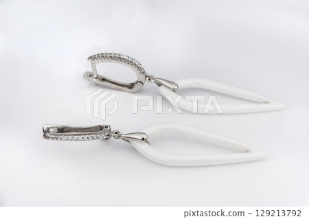 Luxury silver round earrings big jewelry for women isolated on white background, clipping path included 129213792