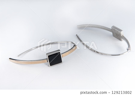 Luxury silver round earrings big jewelry for women isolated on white background, clipping path included 129213802