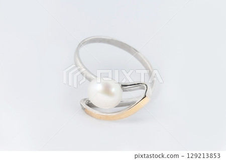 Silver diamond ring isolated on white background. Silver jewelry fashion ring 129213853