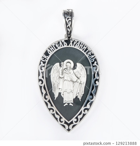 Gold pendant with the Virgin Mary christian symbol isolated on white 129213888