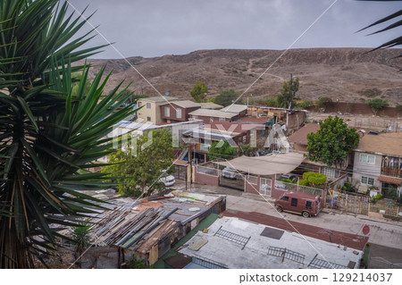 View of the U.S.-Mexico border in Mexican city of Tijuana, highlighting immigration challenges, border security, and economic hardship. View of the U.S.-Mexico border in Mexican city of Tijuana, highlighting immigration challenges, border security, and economic hardship. 129214037
