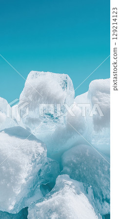 Pristine ice blocks stacked under a clear blue sky creating a crisp and refreshing scene, AI Generative 129214123