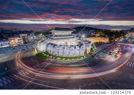 Traffic at Hwaseong Fortress at night, Traditional Architecture of Korea at Suwon, South Korea. Traffic at Hwaseong Fortress at night, Traditional Architecture of Korea at Suwon, South Korea. 129214379