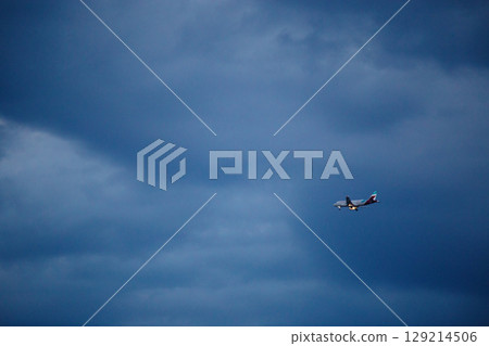 A passenger plane approaches Pula Airport for landing A passenger plane approaches Pula Airport for landing 129214506
