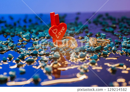 Two gold rings for a girl 129214582