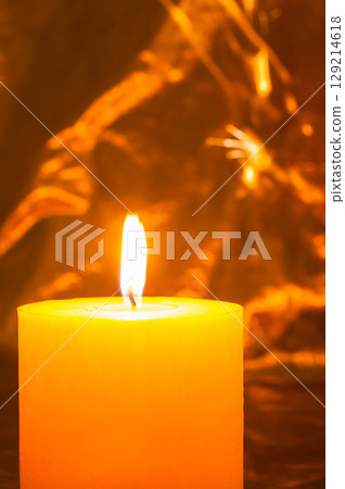 The New Year candle reminds of magical winter moments The New Year candle reminds of magical winter moments 129214618