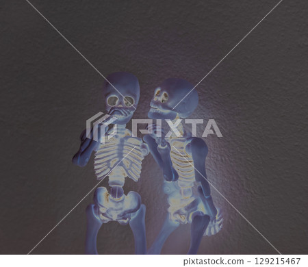 Funny toys human skeletons x-rays by dark background 129215467