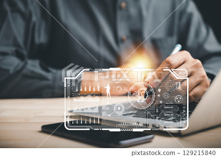 AI analytic data automate digit business strategies technology, as a person uses a pen with a tech interface, showing enterprise data and improving insight by using ai solutions 129215840