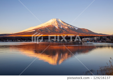 Mt. Fuji in winter with its reflection in the lake Mt. Fuji in winter with its reflection in the lake 129216137