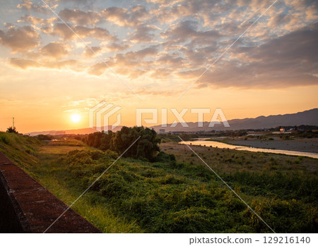 Sunset over the sea, sunset scenery, background material, dramatic sky, travel image Sunset over the sea, sunset scenery, background material, dramatic sky, travel image 129216140