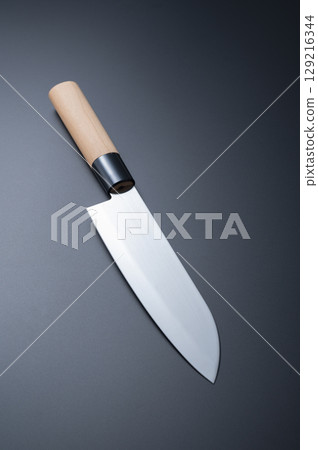 Kitchen knife black background 129216344