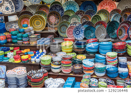 Colorful handmade dishes plates ceramics. Traditional greek ceramics, island Rhodes. Greece Colorful handmade dishes plates ceramics. Traditional greek ceramics, island Rhodes. Greece 129216446