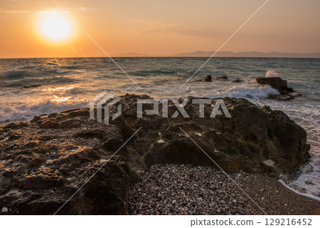 Aegean sea sunset beach sea Rhodes, Greece 129216452
