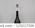 The champagne cork flies up. The concept of the holiday 129217306