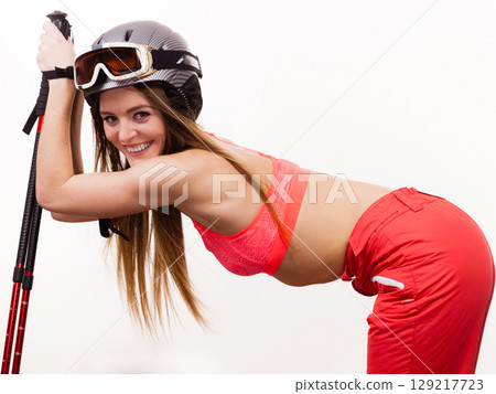 Female skier preparing for season. 129217723