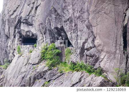 Old tunnel in norwegian rocks mountain Old tunnel in norwegian rocks mountain 129218069