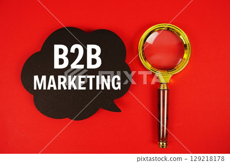 B2B Marketing text with speech bubble and magnifying glass on red background B2B Marketing text with speech bubble and magnifying glass on red background 129218178