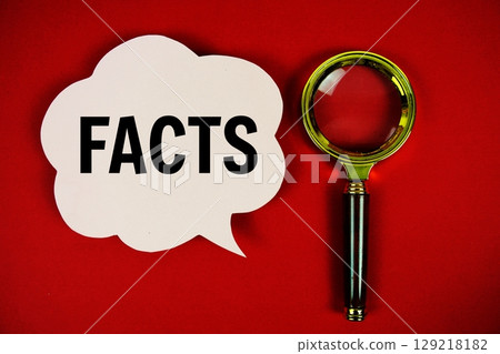 Facts text with speech bubble and magnifying glass on red background 129218182