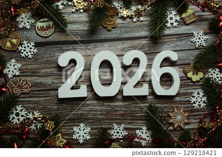 2026 Happy New Year and Christmas decoration on wooden background 2026 Happy New Year and Christmas decoration on wooden background 129218421