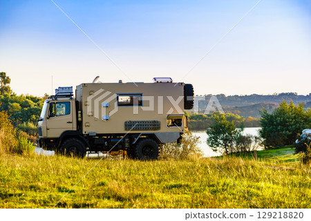Offroad camper 4x4 truck on nature Offroad camper 4x4 truck on nature 129218820