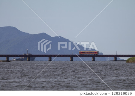 A train running over the Yura River Bridge A train running over the Yura River Bridge 129219059