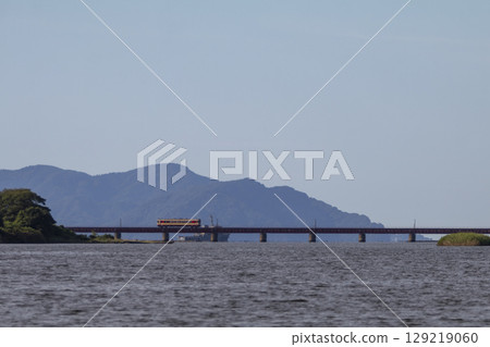 A train running over the Yura River Bridge A train running over the Yura River Bridge 129219060
