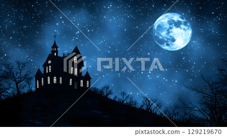 Mysterious Halloween scene with haunted house and moonlight. Designed with open space for text or product placement. 129219670