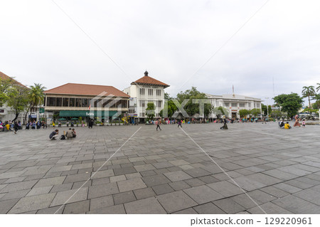 Jakarta, Indonesia - Mar 29,2024 : View of Fatahillah square which is located in Jakarta Old Town in Jakarta, Indonesia on Mar 29,2024. Jakarta, Indonesia - Mar 29,2024 : View of Fatahillah square which is located in Jakarta Old Town in Jakarta, Indonesia on Mar 29,2024. 129220961