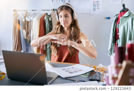 Fashion design, video call and woman with laptop in workshop for online meeting or webinar. Retail, commercial startup and girl designer on computer for video conference with client in design studio Fashion design, video call and woman with laptop in workshop for online meeting or webinar. Retail, commercial startup and girl designer on computer for video conference with client in design studio 129221643