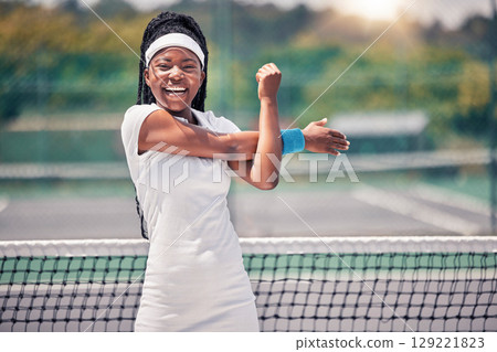 Tennis, sports and stretching with a black woman portrait getting ready for a competition game on court outdoor. Fitness, health and warm up with a female tennis player or athlete training outside Tennis, sports and stretching with a black woman portrait getting ready for a competition game on court outdoor. Fitness, health and warm up with a female tennis player or athlete training outside 129221823