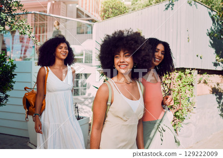 Travel, friends and black woman in summer walking by the countryside or neighborhood with outdoor fashion, wellness and youth lifestyle. Happy gen z, women or group of people with adventure and smile 129222009