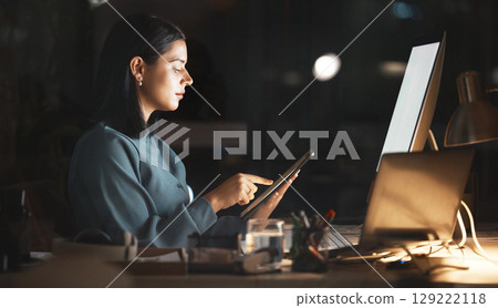 Laptop, computer or business woman on tablet at night in office for research, cloud computing or planning marketing schedule. IT, programmer or developer working overtime review startup cybersecurity Laptop, computer or business woman on tablet at night in office for research, cloud computing or planning marketing schedule. IT, programmer or developer working overtime review startup cybersecurity 129222118