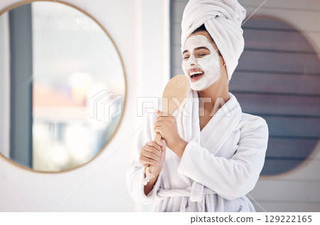 Skincare, bathroom and singing woman in face mask for cosmetics, beauty and wellness happy with benefits or product results. Skin care dermatology, facial cleaning mask and fun music girl in morning 129222165