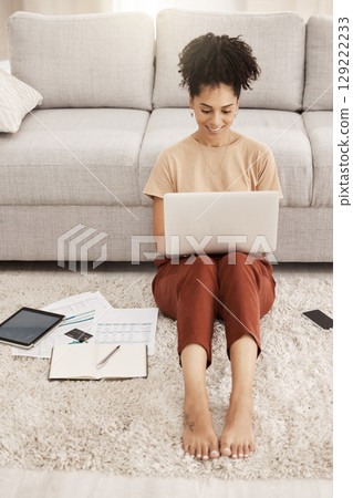 Remote work, black woman and home working of a woman on a computer planning a job schedule. Digital employee work on living room floor to plan online marketing research strategy in a house happy Remote work, black woman and home working of a woman on a computer planning a job schedule. Digital employee work on living room floor to plan online marketing research strategy in a house happy 129222233