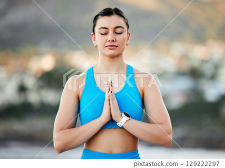 Yoga, meditation and prayer woman in nature for calm, peace and healing energy with thinking idea or spiritual. Sports, fitness or pilates girl with praying hands sign, meditate in park for wellness Yoga, meditation and prayer woman in nature for calm, peace and healing energy with thinking idea or spiritual. Sports, fitness or pilates girl with praying hands sign, meditate in park for wellness 129222297