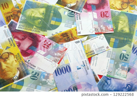 Swiss franc banknotes. The current francs money bills lies on table in big amount 129222568