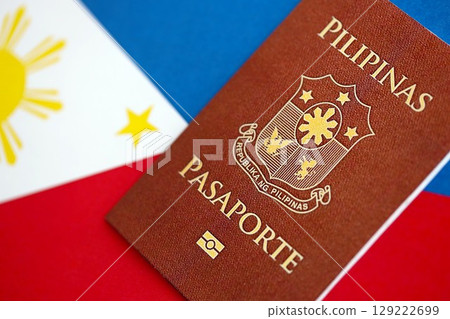 Philippines passport on flag. The concept of citizenship 129222699