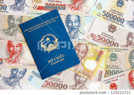 Vietnamese dong currency money bills and passport. The concept of travel and vacation 129222721
