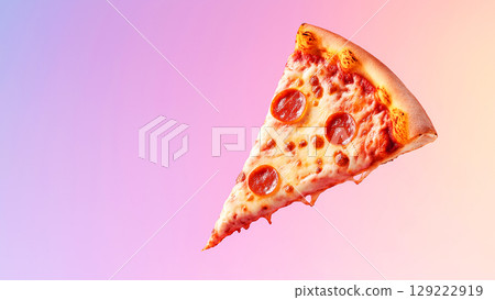 Single slice of pepperoni pizza with melted cheese dripping against vibrant, colorful backdrop 129222919