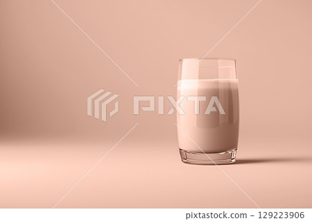 Tall glass of iced tea sitting on a smooth mocha mousse surface. Modern trendy tone hue shade 129223906