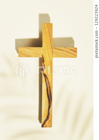 Wooden crucifixion with palm leaf shadow on light background. Religion card suitable for faith religion, christian holidays, Easter, Redeemer, the Feast of Corpus Christi 129223924