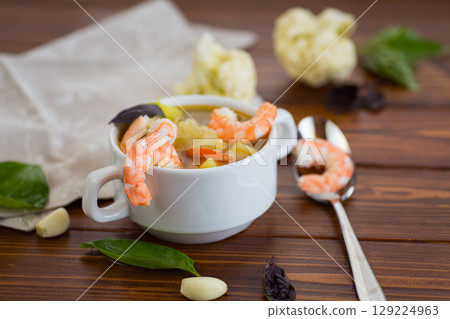 Homemade Vegetable Broth with Shrimp and Fresh Basil Homemade Vegetable Broth with Shrimp and Fresh Basil 129224963