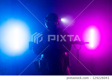 Tactical Soldier in Action Helmet On Off Dramatic Lights Smoke Tactical Soldier in Action Helmet On Off Dramatic Lights Smoke 129226041