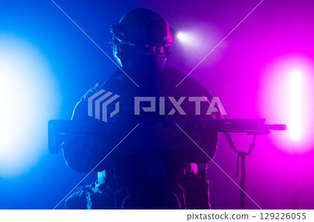 Tactical Soldier in Action Helmet On Off Dramatic Lights Smoke Tactical Soldier in Action Helmet On Off Dramatic Lights Smoke 129226055
