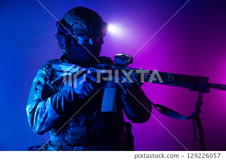 Tactical Soldier in Action Helmet On Off Dramatic Lights Smoke Tactical Soldier in Action Helmet On Off Dramatic Lights Smoke 129226057