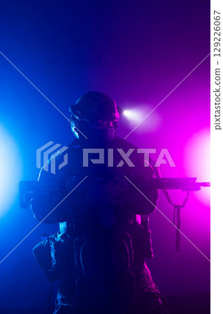 Tactical Soldier in Action Helmet On Off Dramatic Lights Smoke Tactical Soldier in Action Helmet On Off Dramatic Lights Smoke 129226067