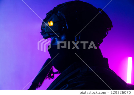Tactical Soldier in Action Helmet On Off Dramatic Lights Smoke 129226070