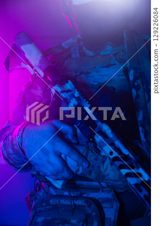 Tactical Soldier in Action Helmet On Off Dramatic Lights Smoke Tactical Soldier in Action Helmet On Off Dramatic Lights Smoke 129226084