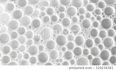 white soap bubbles creating a circular pattern, texture and cleanliness concept 129226381